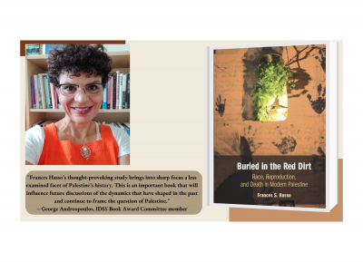 Woman headshot in front of bookshelf with the picture of the cover of her book  